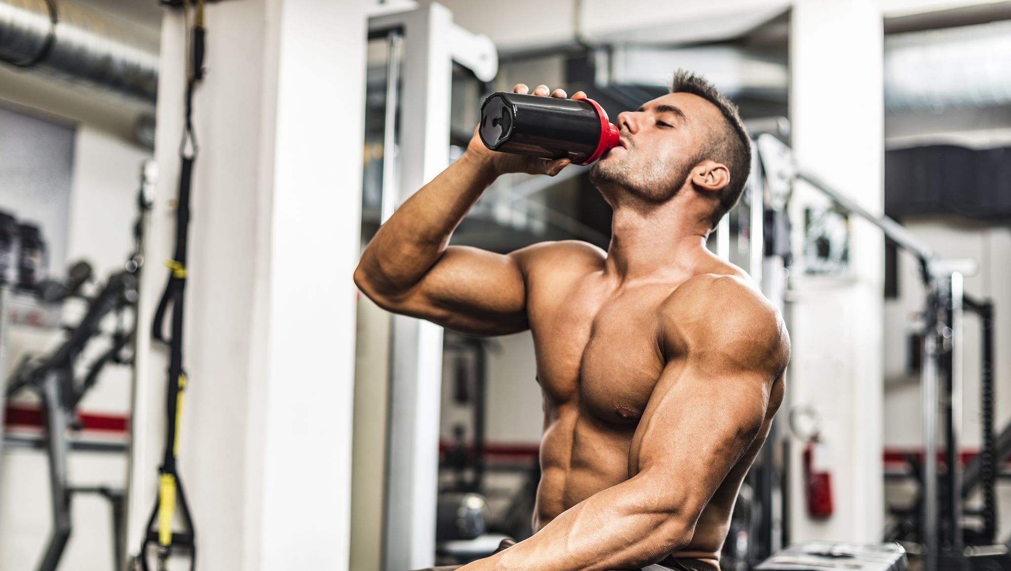 https://hips.hearstapps.com/hmg-prod/images/young-man-drinking-his-proteins-at-the-gym-royalty-free-image-618752690-1546450244.jpg?crop=1.00xw:0.847xh;0,0.0725xh&resize=2048:*