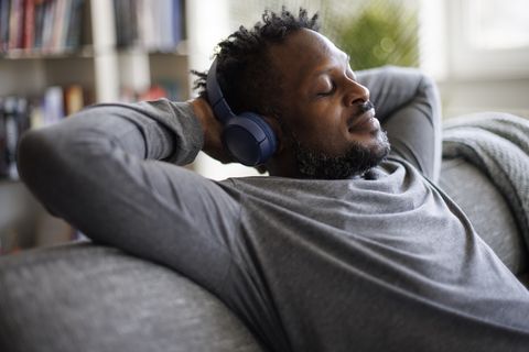 man wearing headphones and meditating