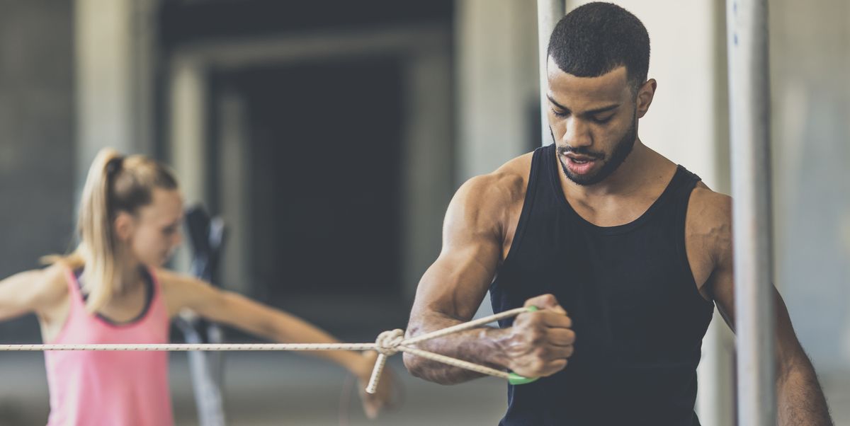 This Simple Resistance Band Move Will Crush Your Biceps