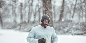 Young man exercising in the forest