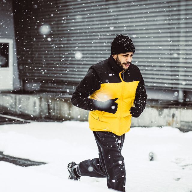young man exercising in winter