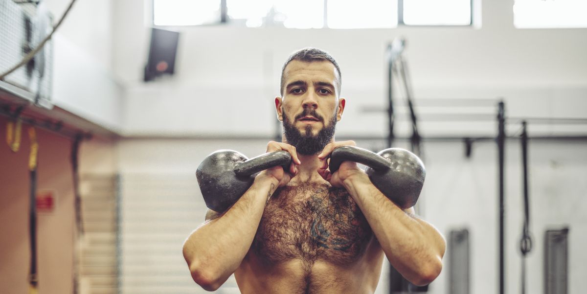 https://hips.hearstapps.com/hmg-prod/images/young-man-is-doing-cross-training-exercise-royalty-free-image-1756132731.pjpeg?crop=1.00xw:0.752xh;0,0.106xh&resize=1200:*