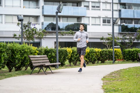 young man jogging in park