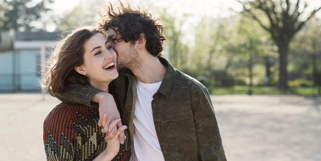 Young man kissing girlfriend