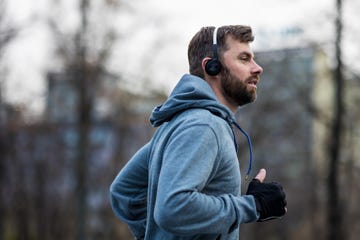 young man running in the city