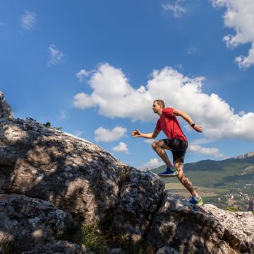 young man running on mountain