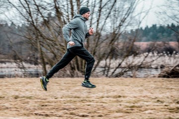 young man running on the field