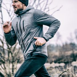 young man running on the field