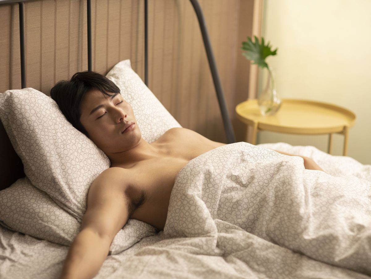 Asian Husband Sleeping - A Doctor Shares the Gross Reason Why You Should Never Sleep Naked