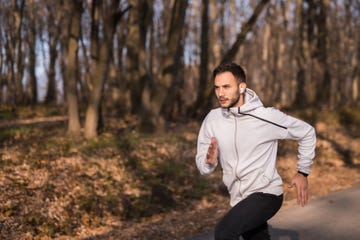 young sportsman running in nature