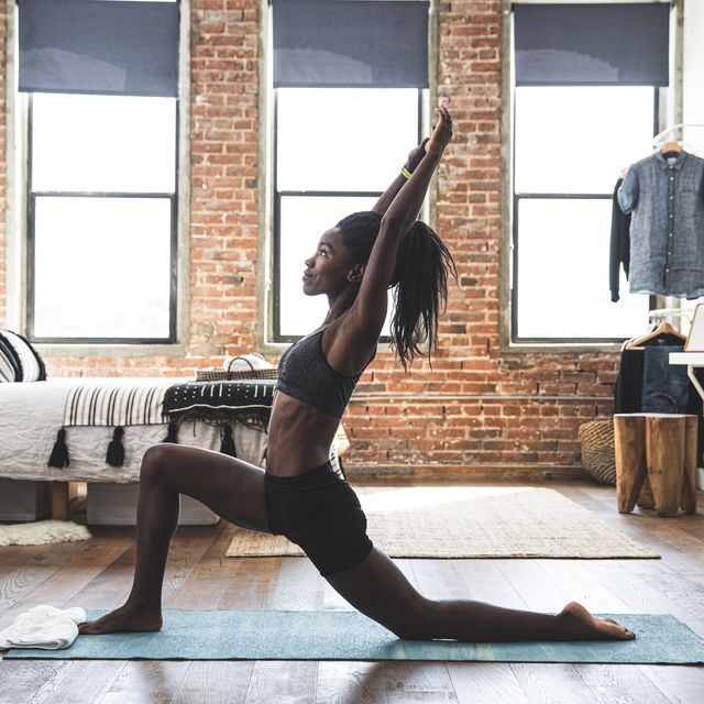 https://hips.hearstapps.com/hmg-prod/images/young-sporty-woman-practicing-yoga-at-home-royalty-free-image-1634655302.jpg?crop=0.667xw:1.00xh;0.150xw,0&resize=640:*