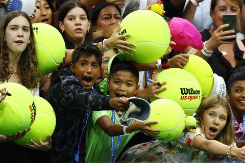 young tennis fans wait for autographs