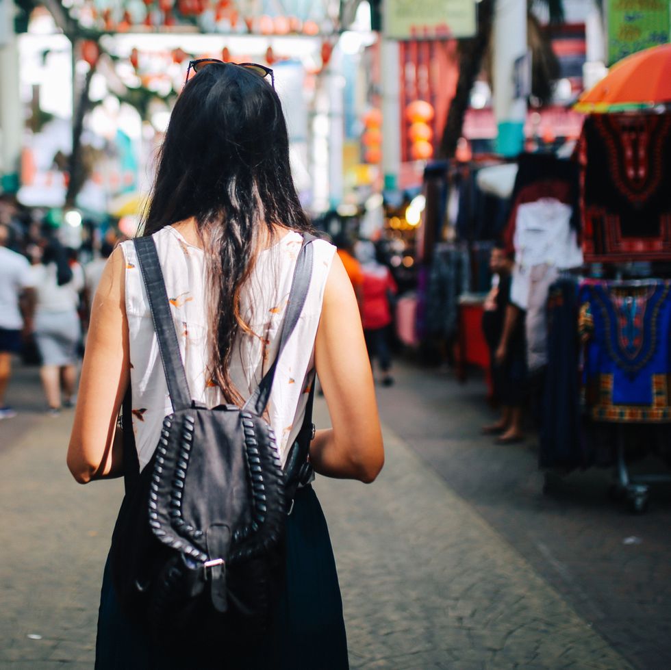 Young traveler woman in Kuala Lumpur Chinatown district