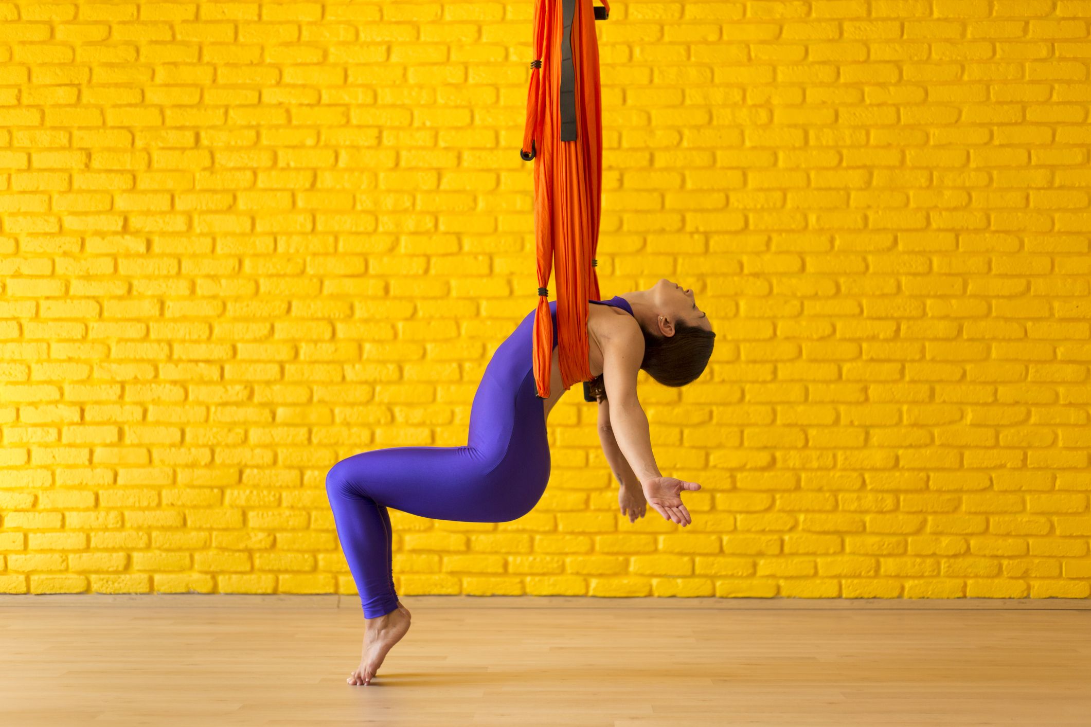 Aerial Yoga: Tips for Beginners, Health Benefits, Poses, and More