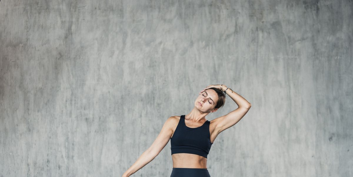 https://hips.hearstapps.com/hmg-prod/images/young-woman-doing-neck-stretching-exercise-royalty-free-image-1749045786.pjpeg?crop=1.00xw:0.756xh;0,0.217xh&resize=1200:*