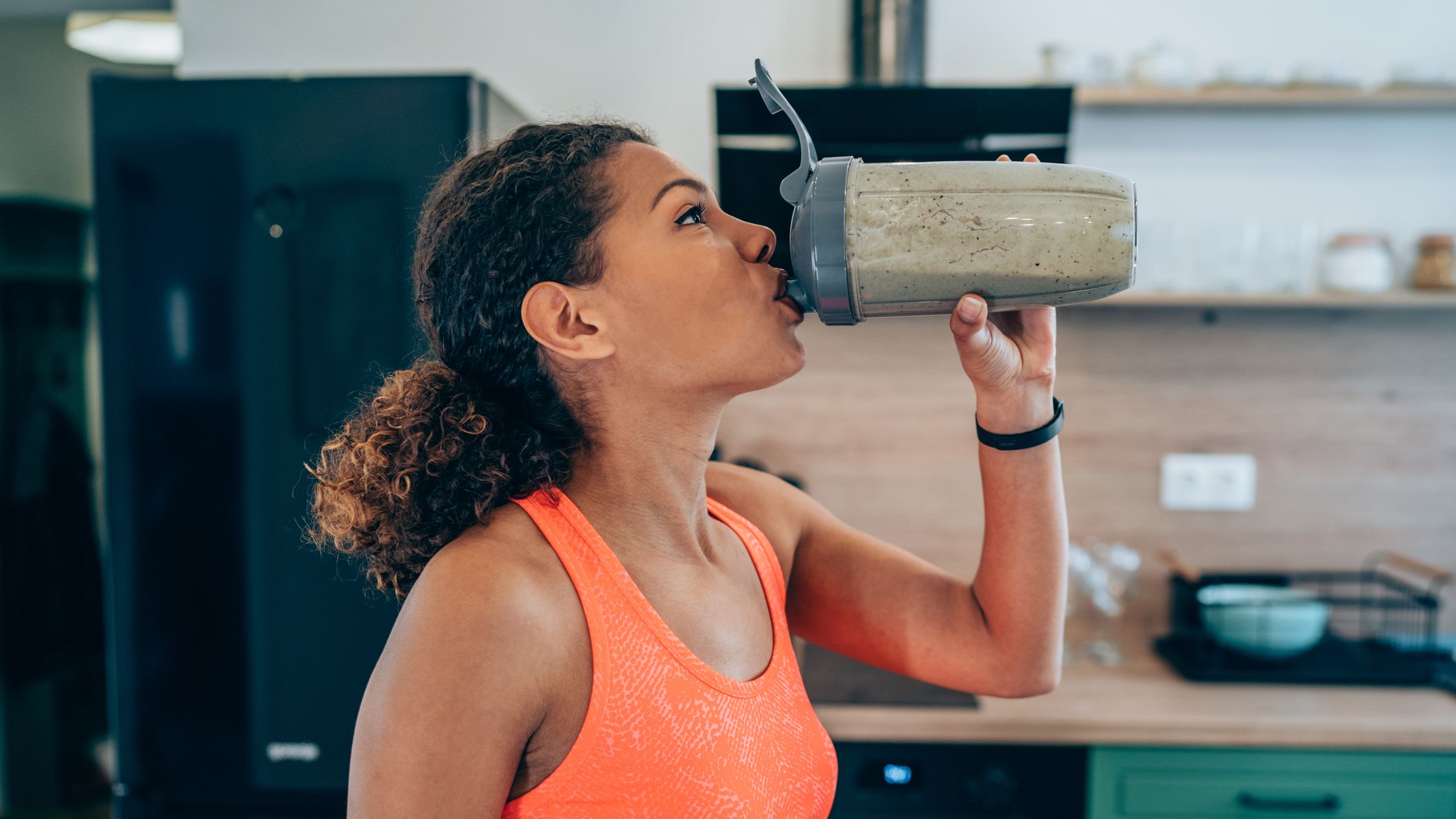 https://hips.hearstapps.com/hmg-prod/images/young-woman-drinking-protein-shake-after-workout-at-royalty-free-image-1692825072.jpg?crop=1xw:0.84375xh;center,top