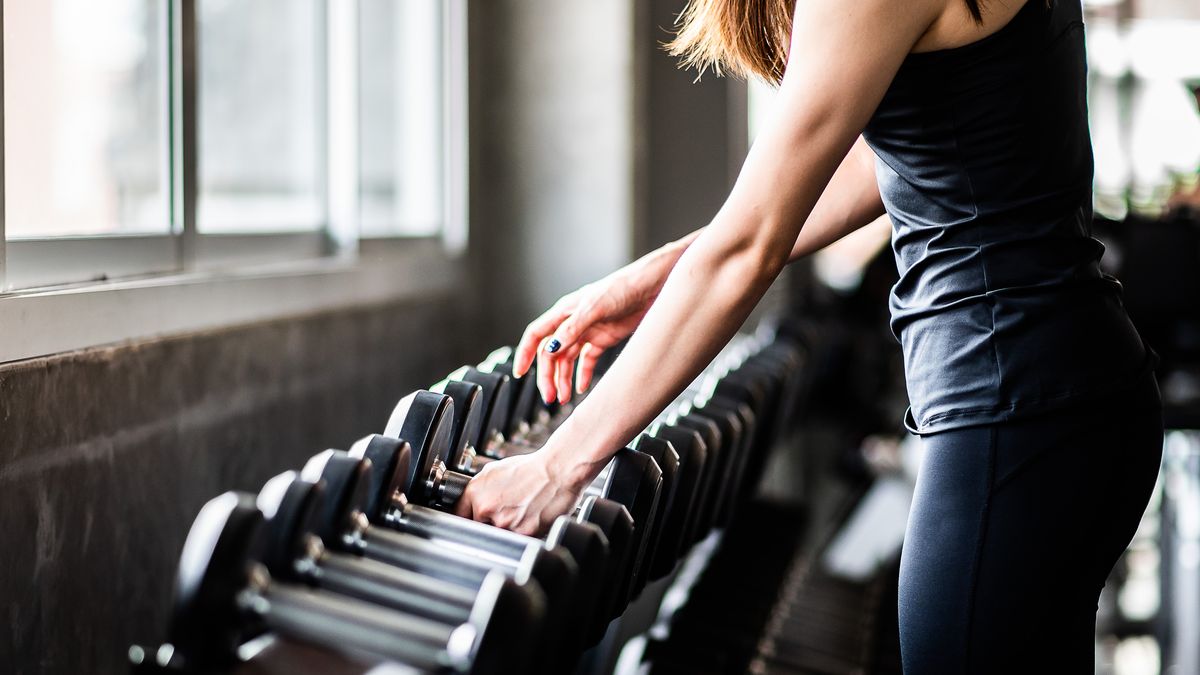 A Woman Working Out at the Gym · Free Stock Photo