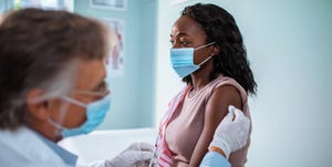 young woman getting vaccinated