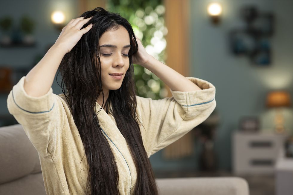 young woman hair care, stock photo