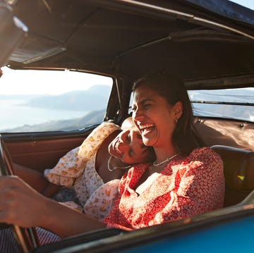 young woman in car with female friend