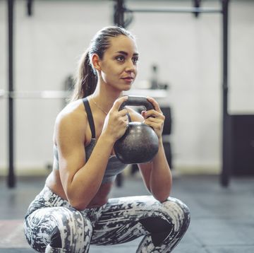 young woman is doing cross training exercise together