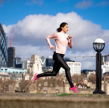 young woman jogging in the city of london