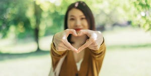 young woman loving and caring nature