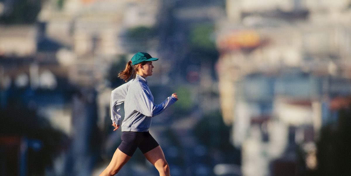 https://hips.hearstapps.com/hmg-prod/images/young-woman-powerwalking-in-urban-area-profile-royalty-free-image-1742582141.pjpeg?crop=1.00xw:0.755xh;0,0.203xh&resize=1200:*