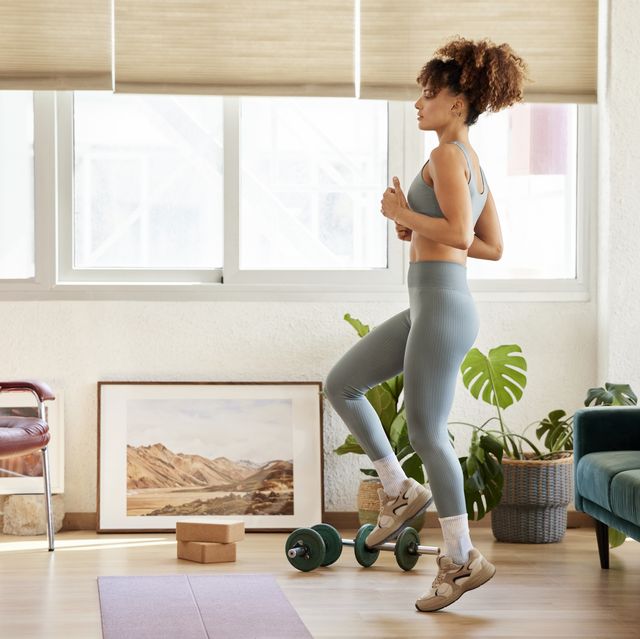 young woman practicing exercise at home