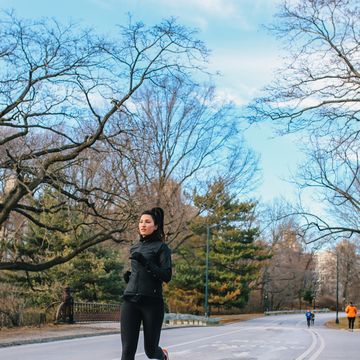 young woman running in nyc central park