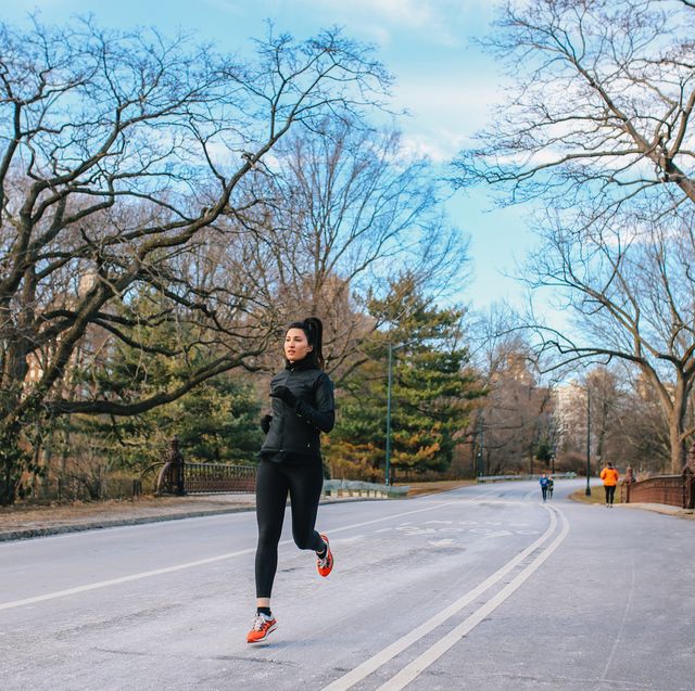 young woman running in nyc central park