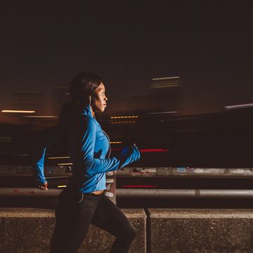 young woman running in the city