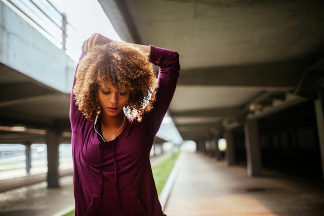 young woman stretching