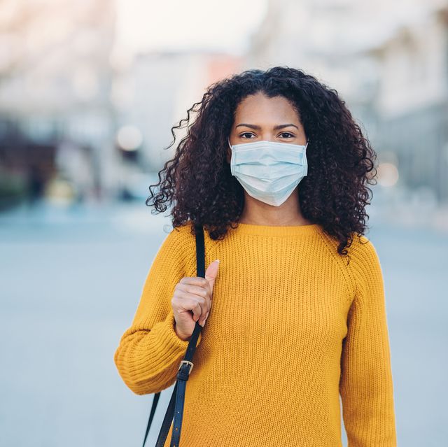 young woman with a mask during pandemic