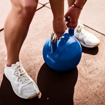 Young woman with Kettle bell young woman with kettle bell