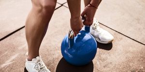 young woman with kettle bell
