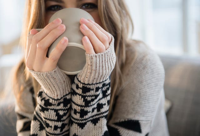 Young woman with mug