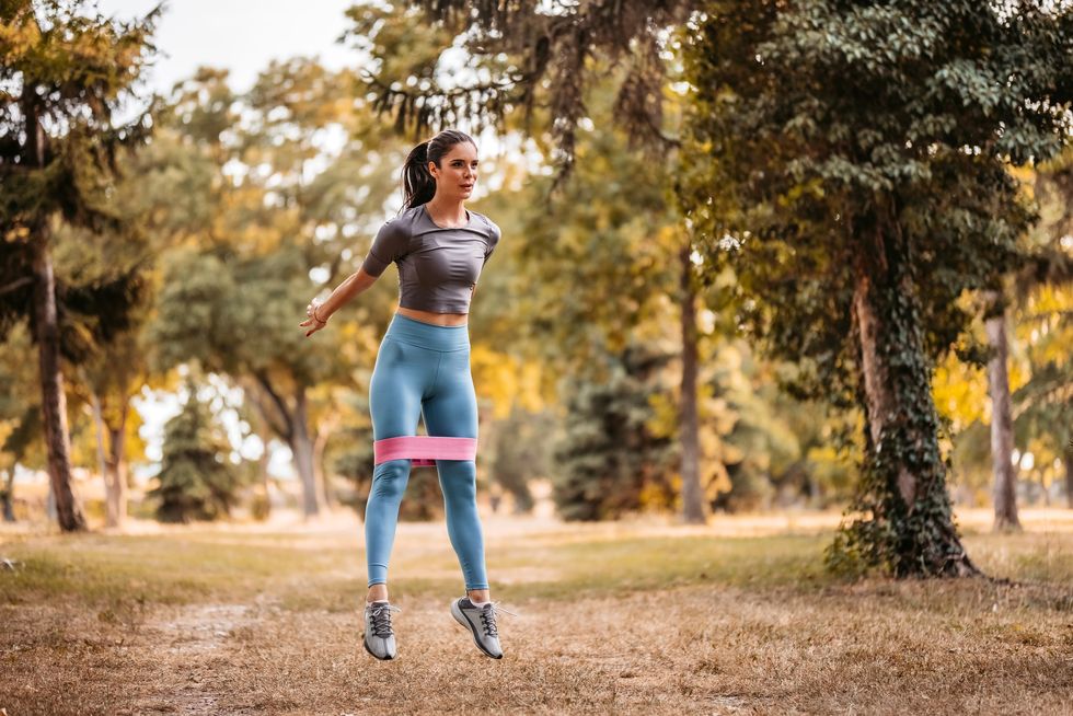 young woman workout in park