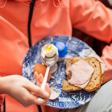 Young Women eating Breakfast before going on a run young women eating breakfast before going on a run