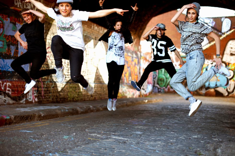 young women jumping in mid air