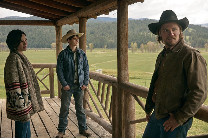 LR Kelsey Asbille as Monica Long, Brecken Merrill as Tate Dutton, Luke Grimes as Kacey Dutton in episode 509 of Paramount Network's Yellowstone 