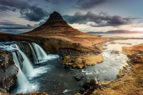 The night left a thin layer of snow over the highest mountains in fresh air that is difficult to have in our cities describes photographer Alessandro Mari Here the runoff from Icelands most photographed mountain forms a waterfall