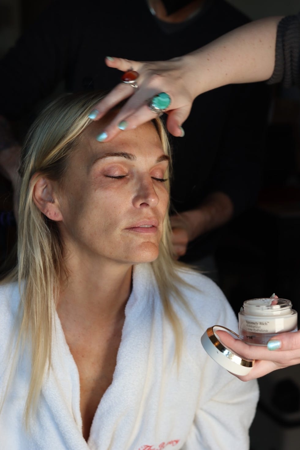 molly sims having skincare applied