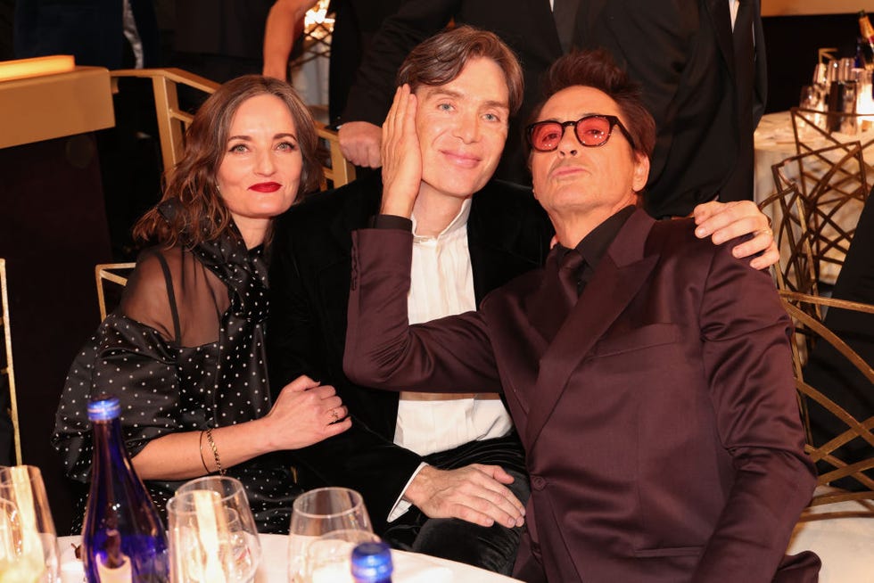 yvonne mcguinness, cillian murphy, and robert downey jr during the golden globes