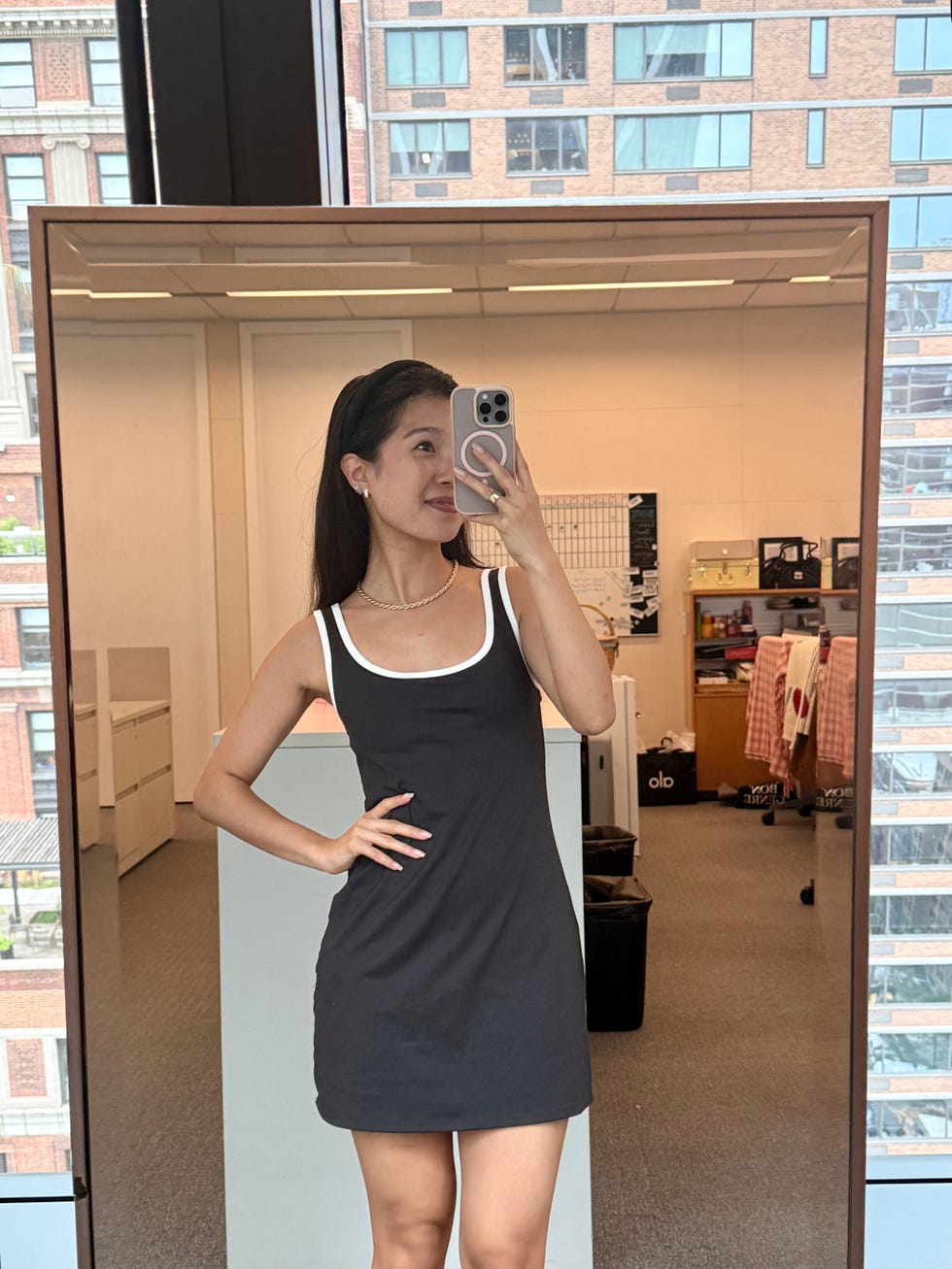 person wearing a short black dress