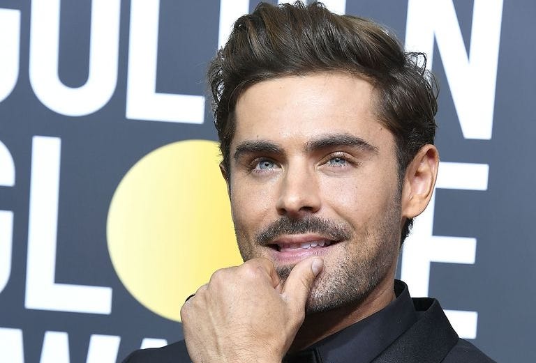 Zac Efron Debuts Platinum Hair at Sundance Film Festival Zac Efron Debuts Platinum Hair at Sundance Film Festival