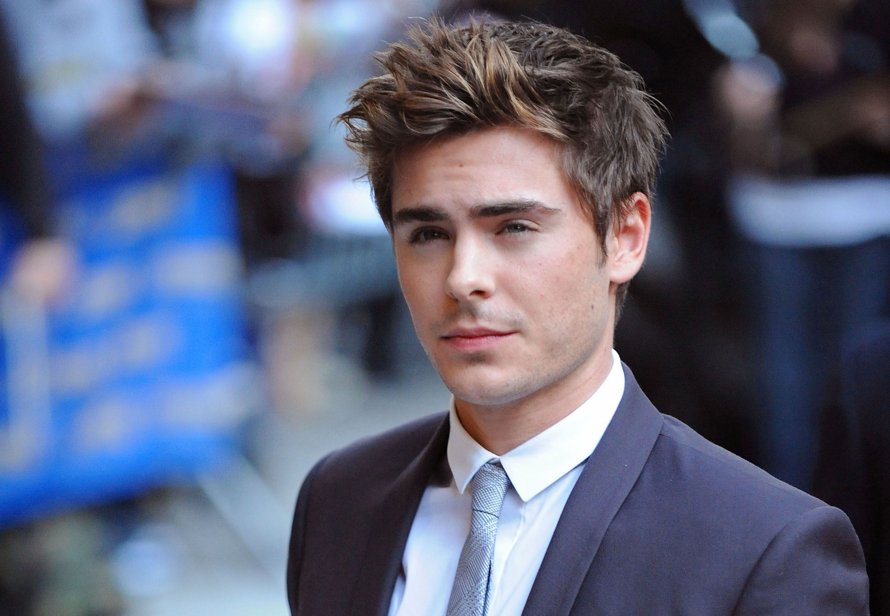 Zac Efron is unrecognizable with beefed up physique, bowl haircut