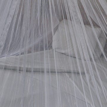 White, Bridal accessory, Veil, Mosquito net, Dress, Bridal veil, Floor, Flooring, 