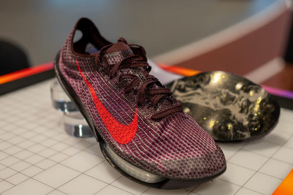sport shoe designed for running with a vivid accent color