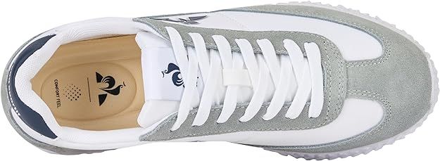 Le Coq Sportif rebaja de 85 a 45 euros las zapatillas blancas mas bonitas y elegantes que los hombres de mas de 50 anos llevan con bermudas y polo en verano